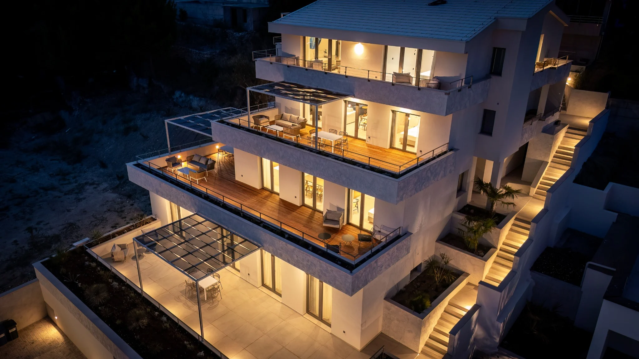 Almissum Residences luxury property at night in Omiš Croatia